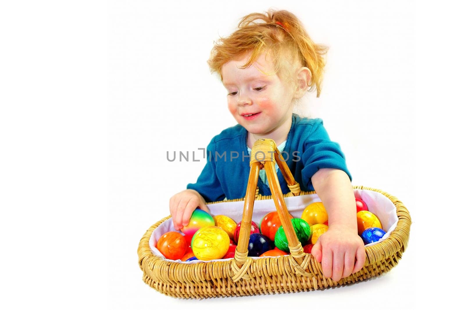 Little girl with easter egg basket