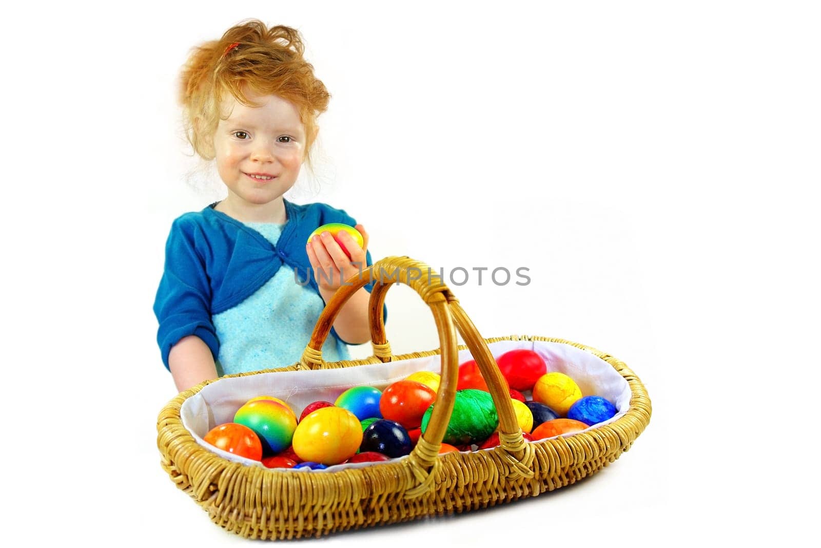Little girl with easter egg basket