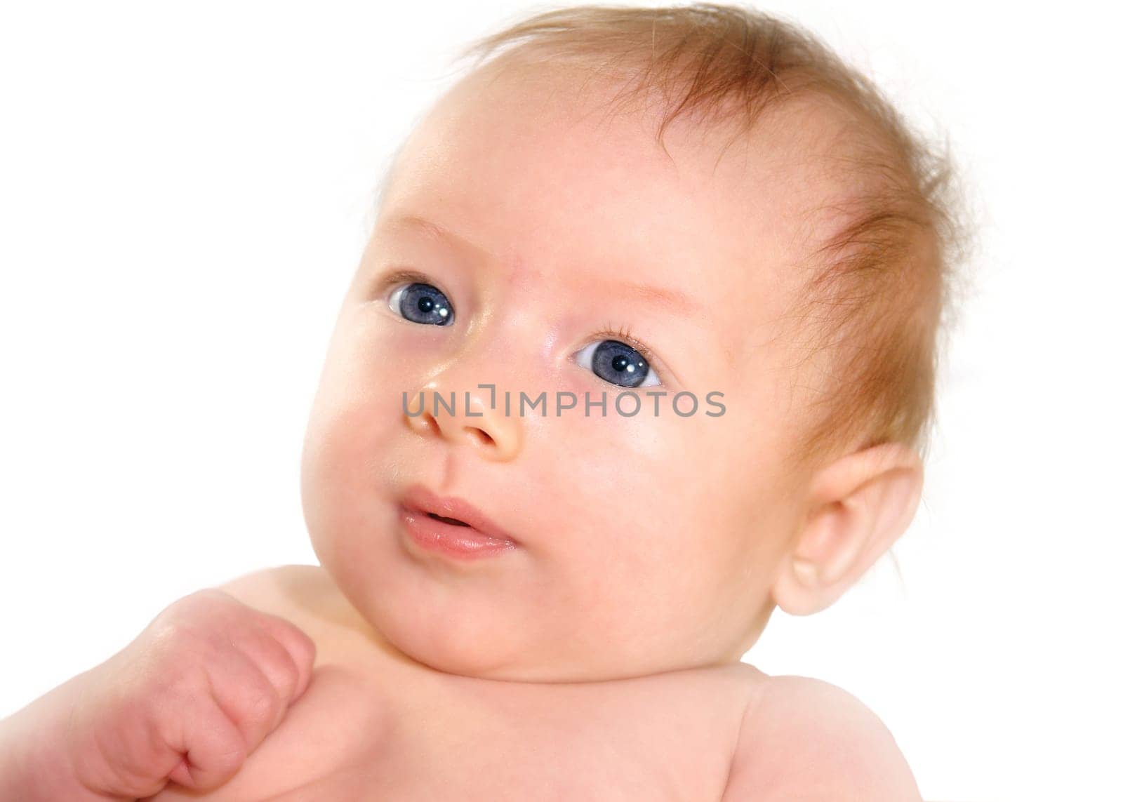 Little baby girl looks friendly