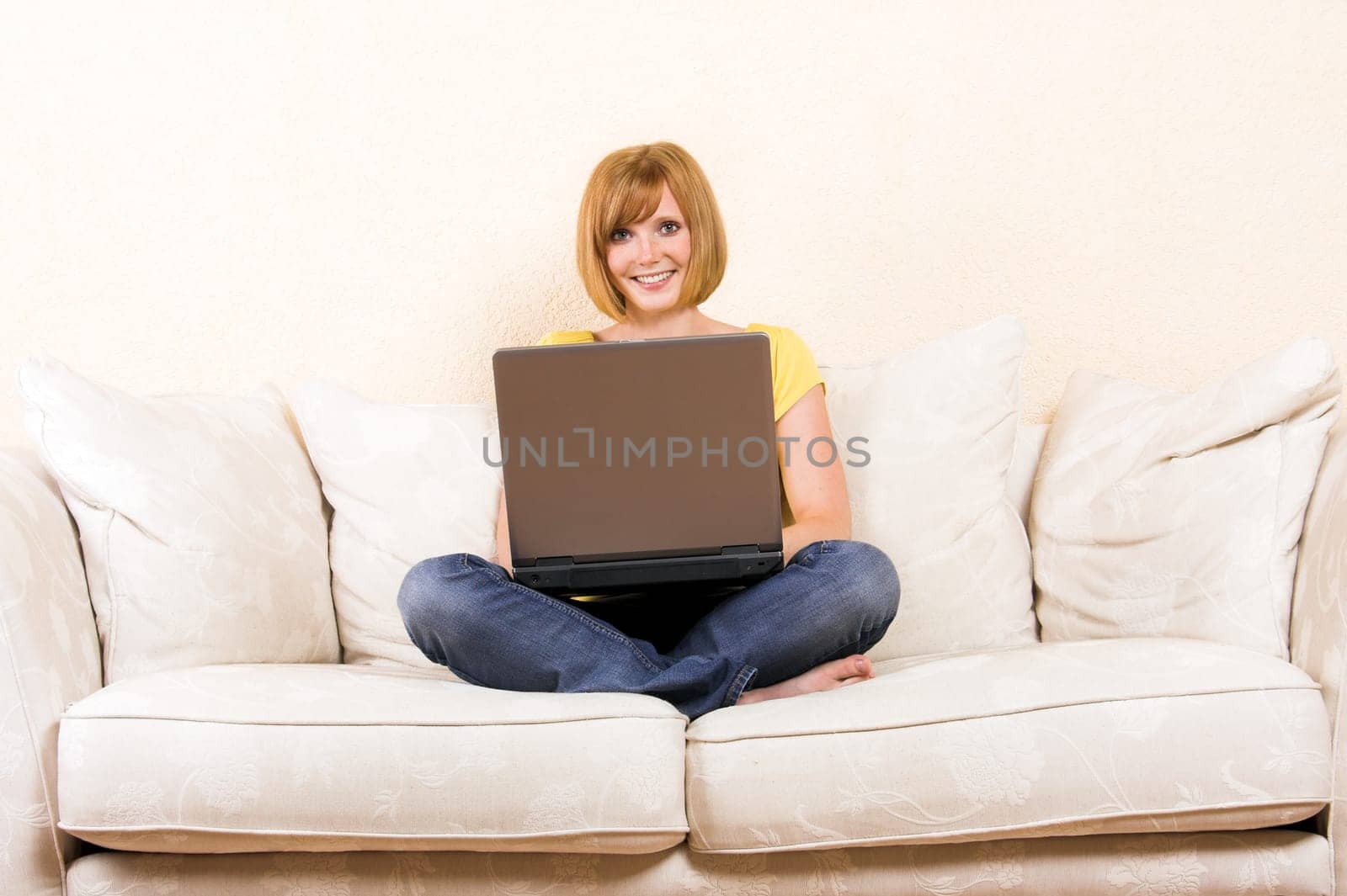 laughing woman with laptop
