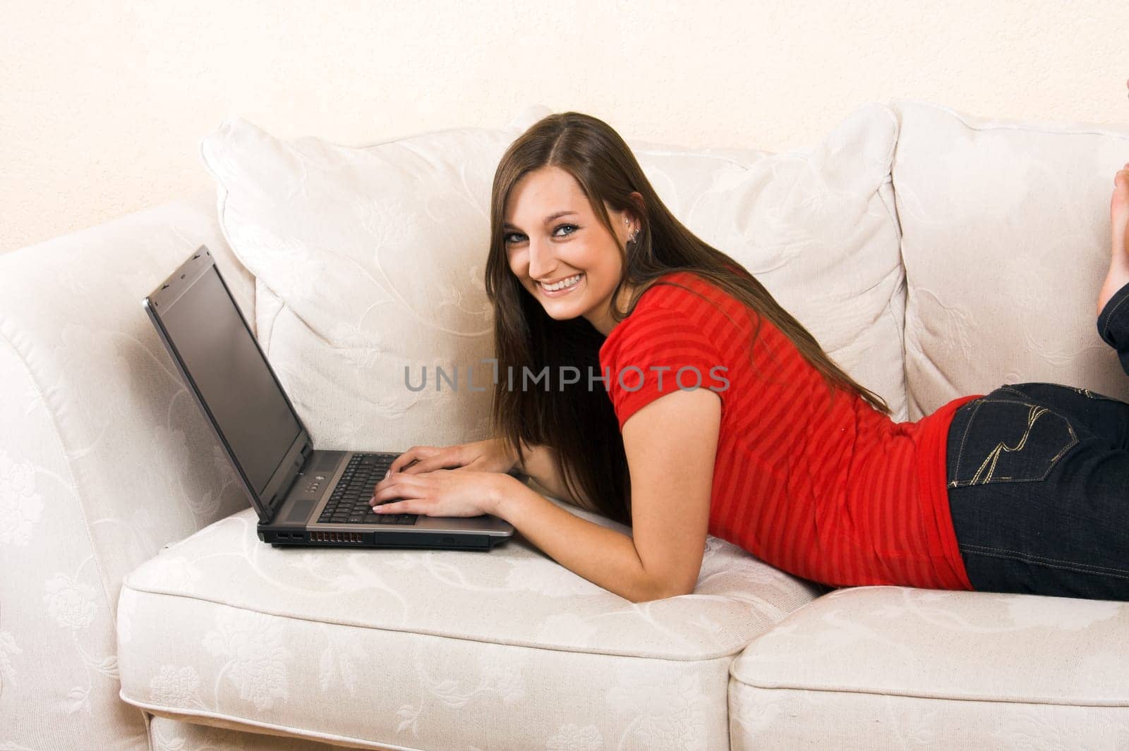laughing woman with laptop