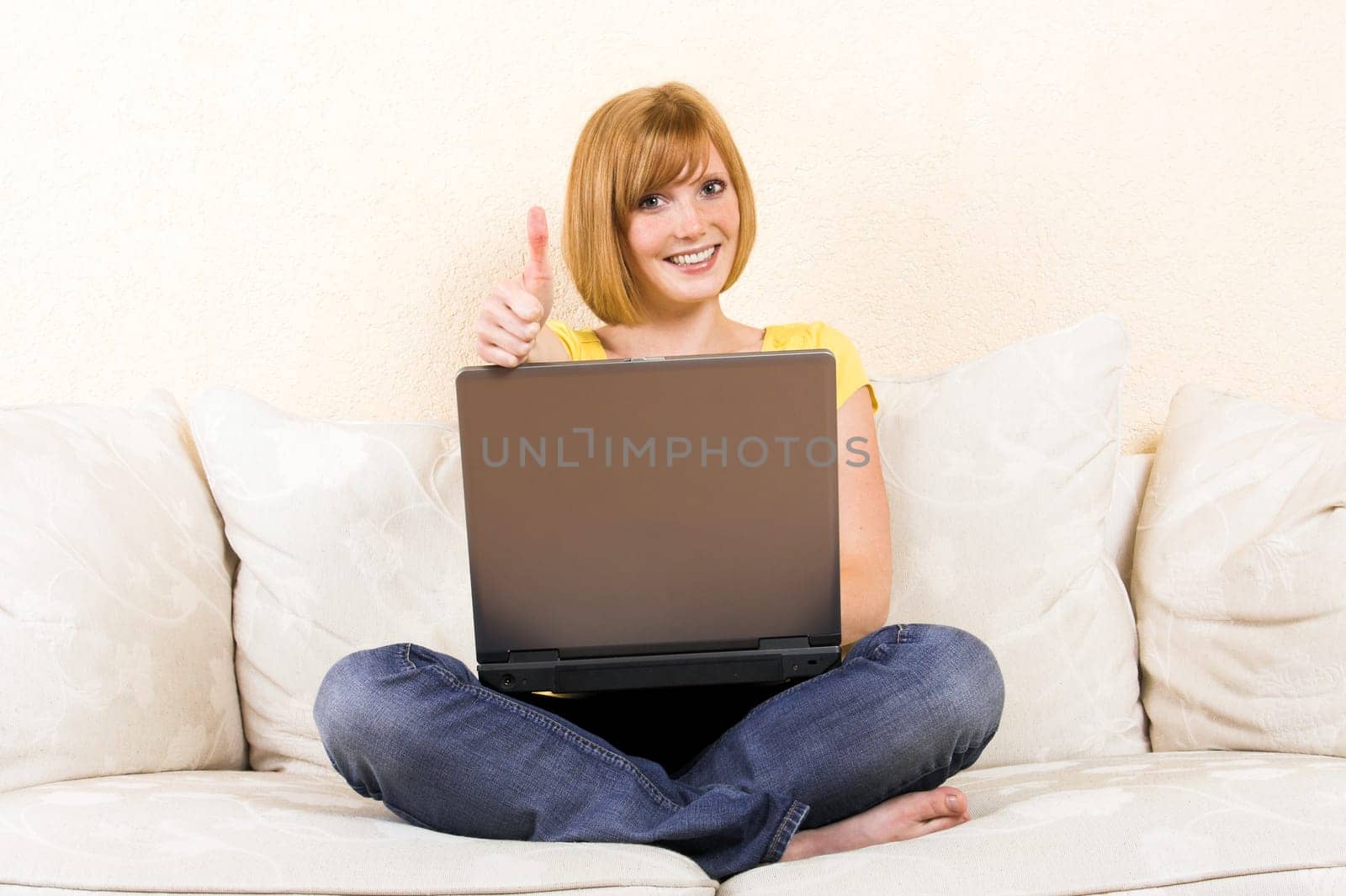 laughing woman with laptop