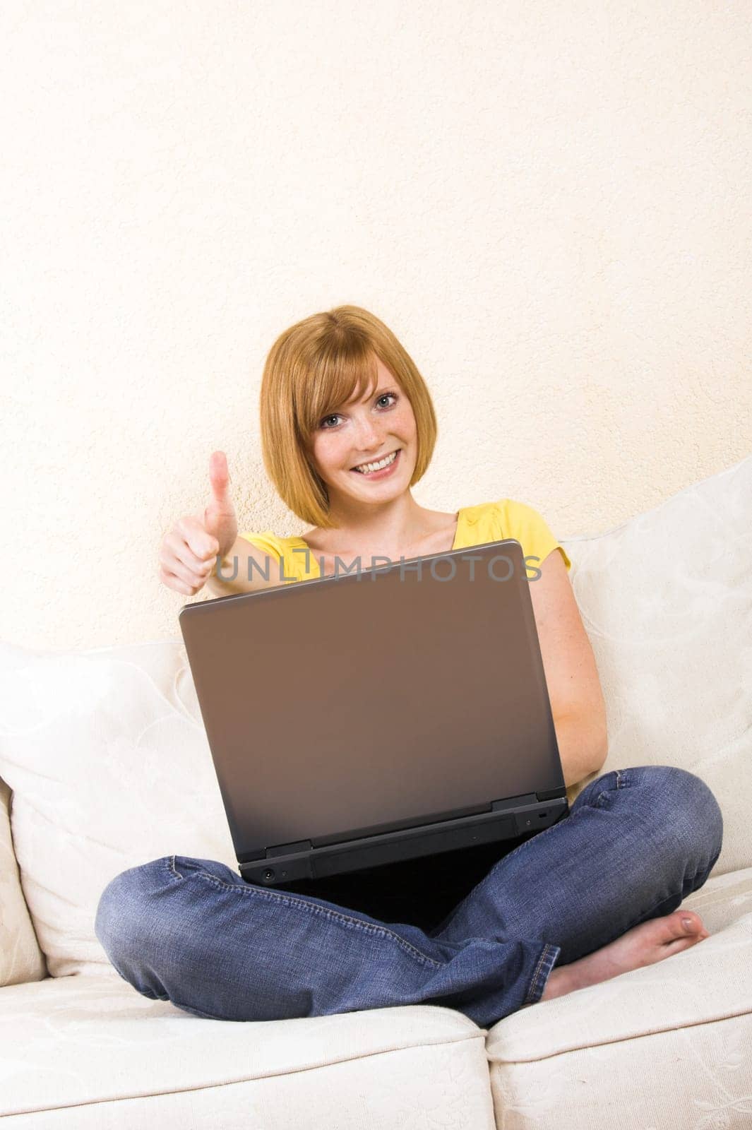laughing woman with laptop