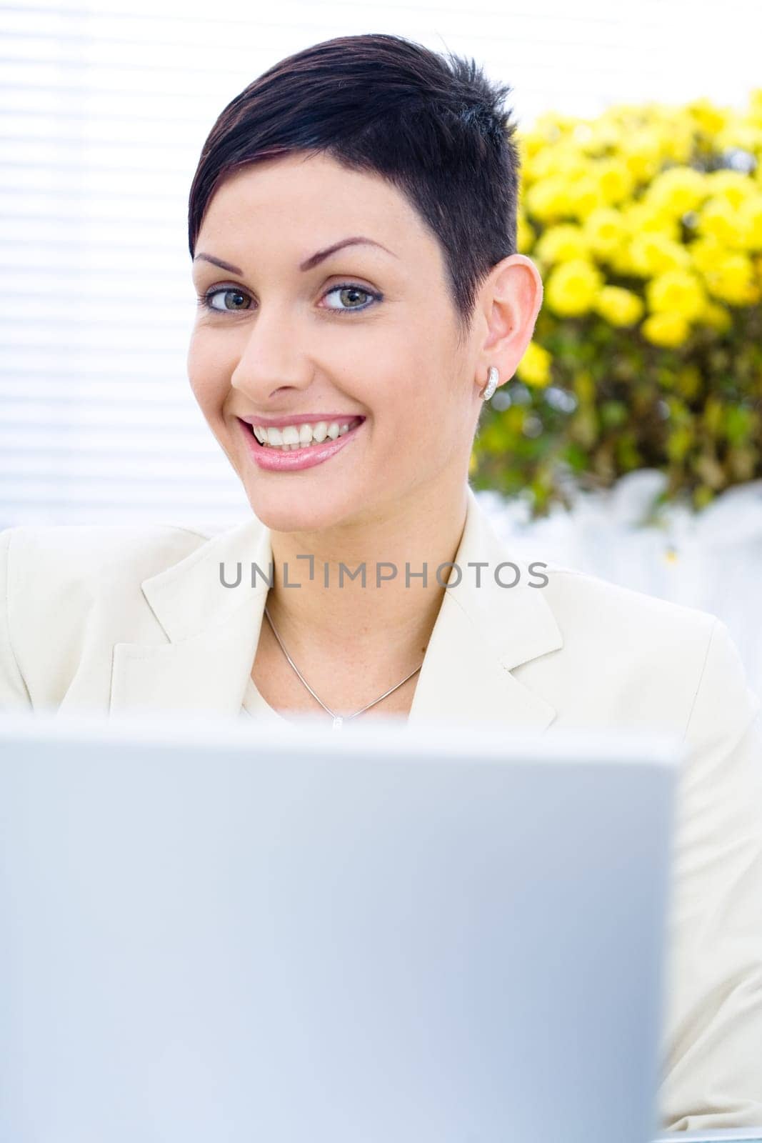 Businesswoman working on laptop