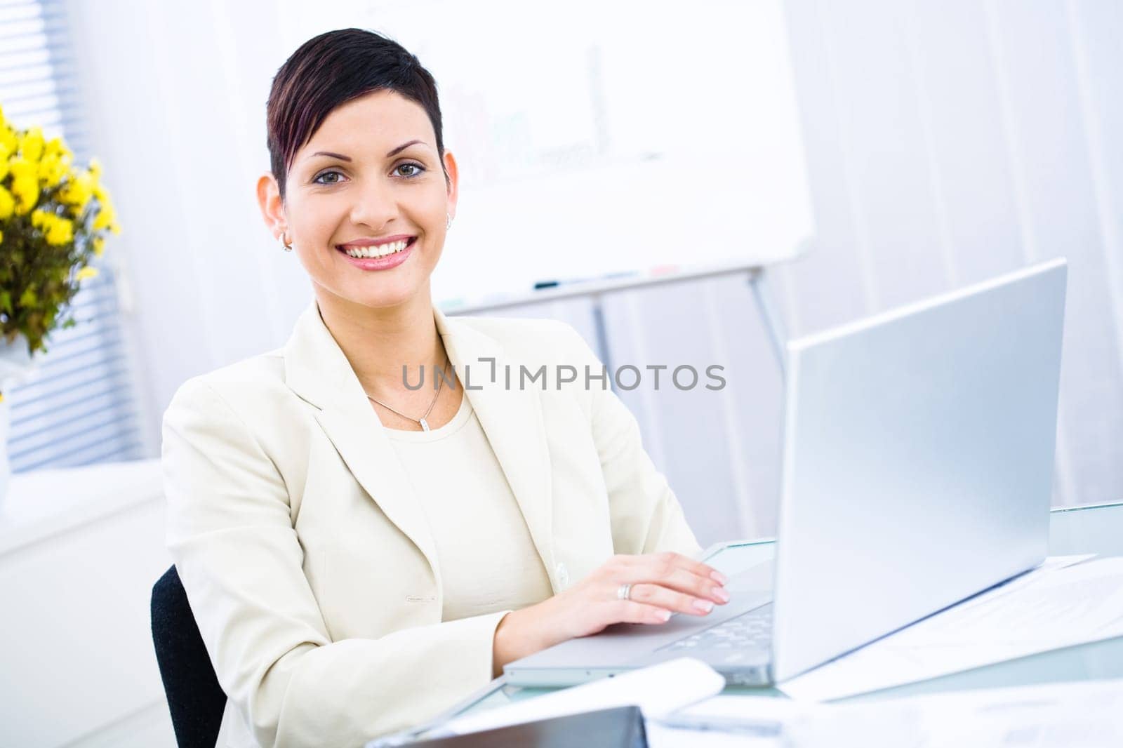Businesswoman working on laptop