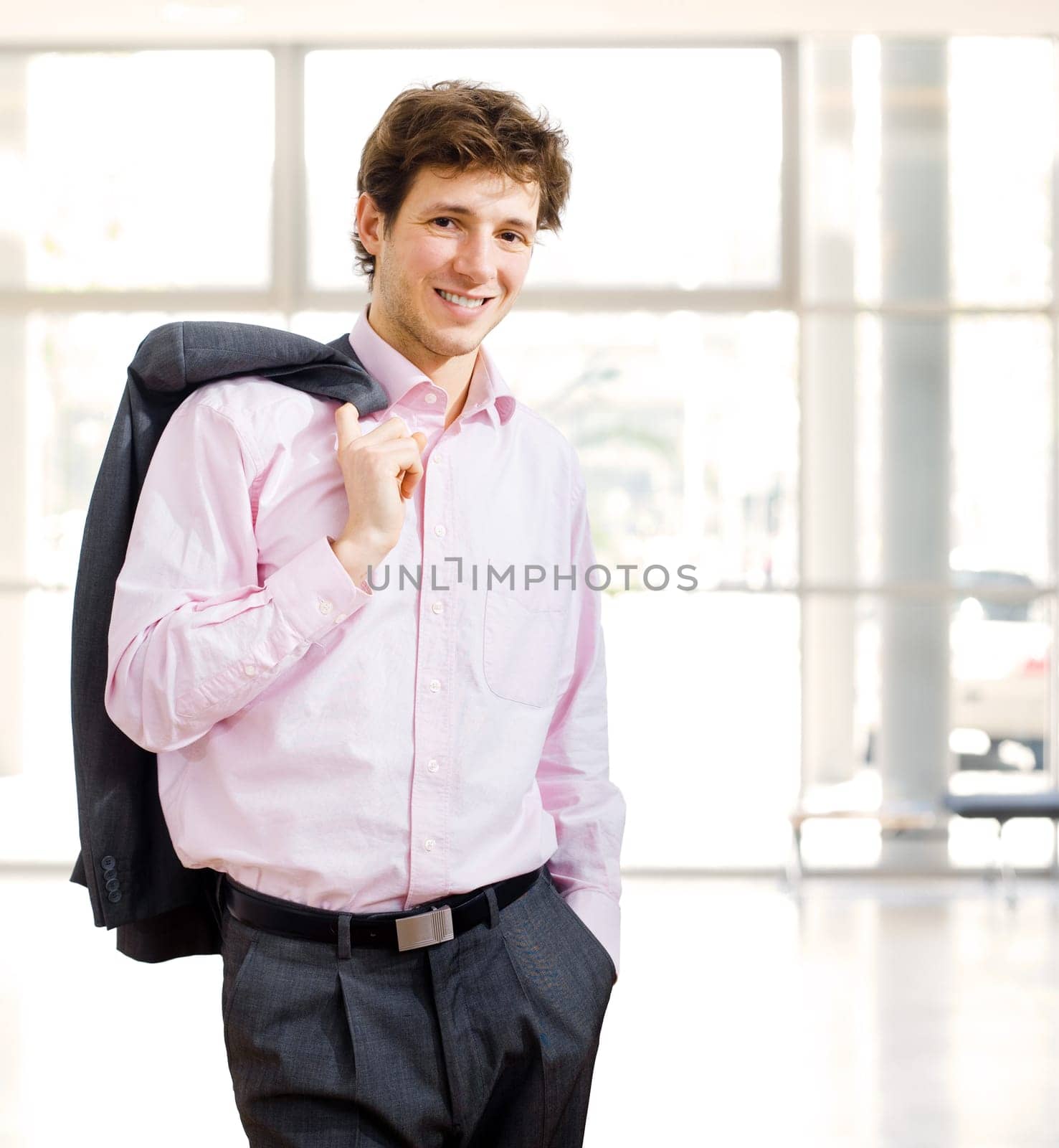Effortless businessman in office building