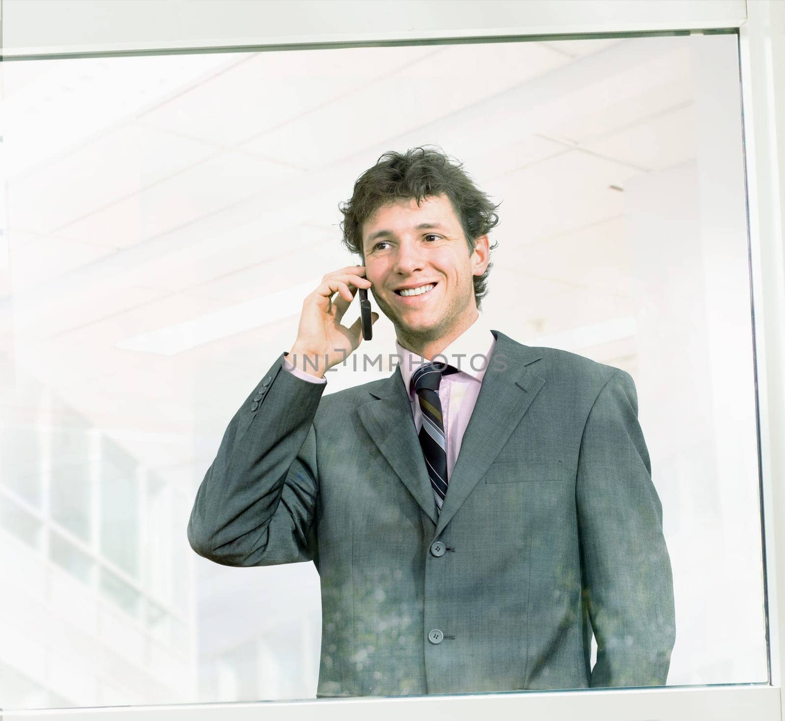 Businessman calling on cellphone