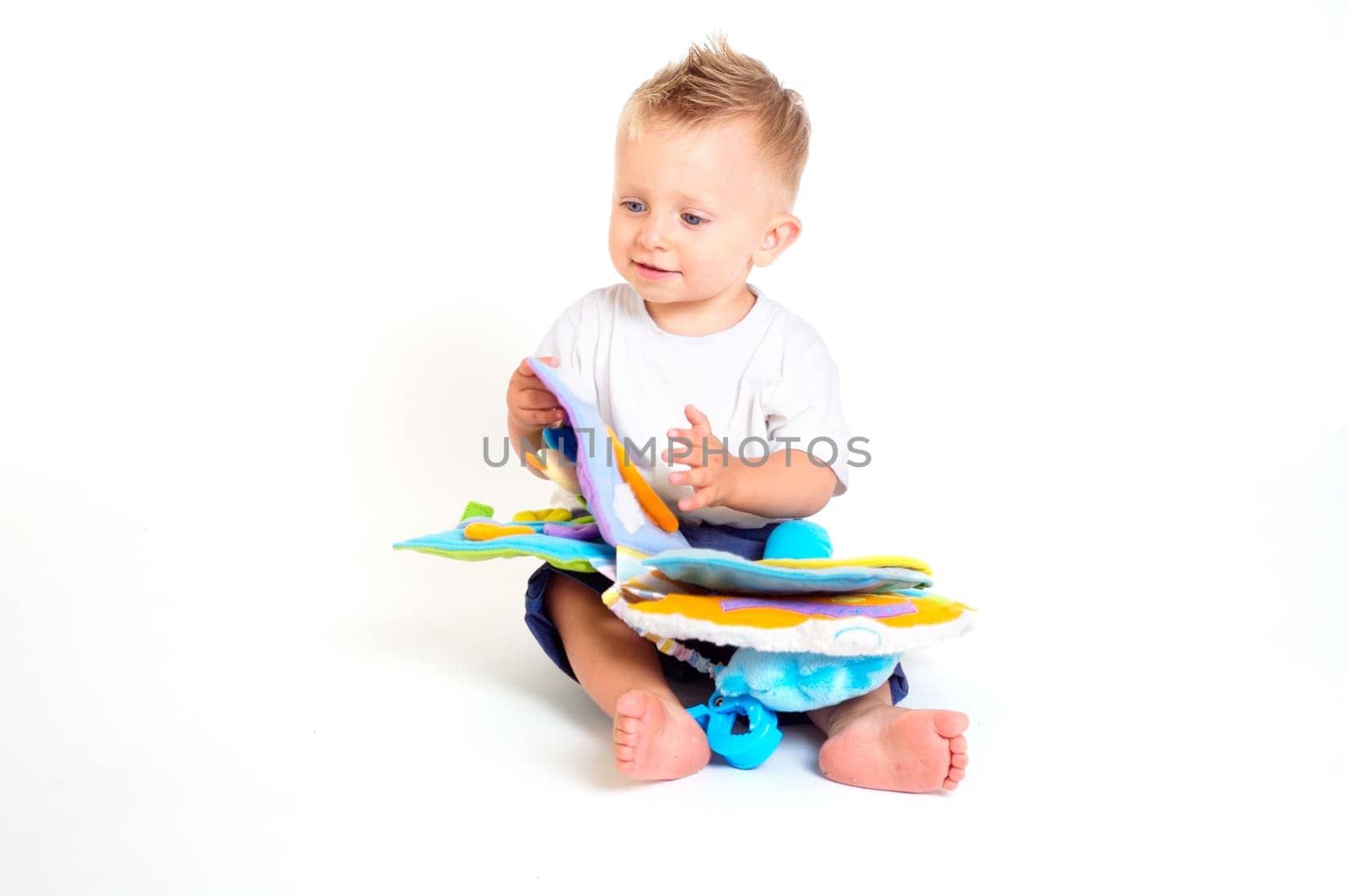 Baby plays with toys
