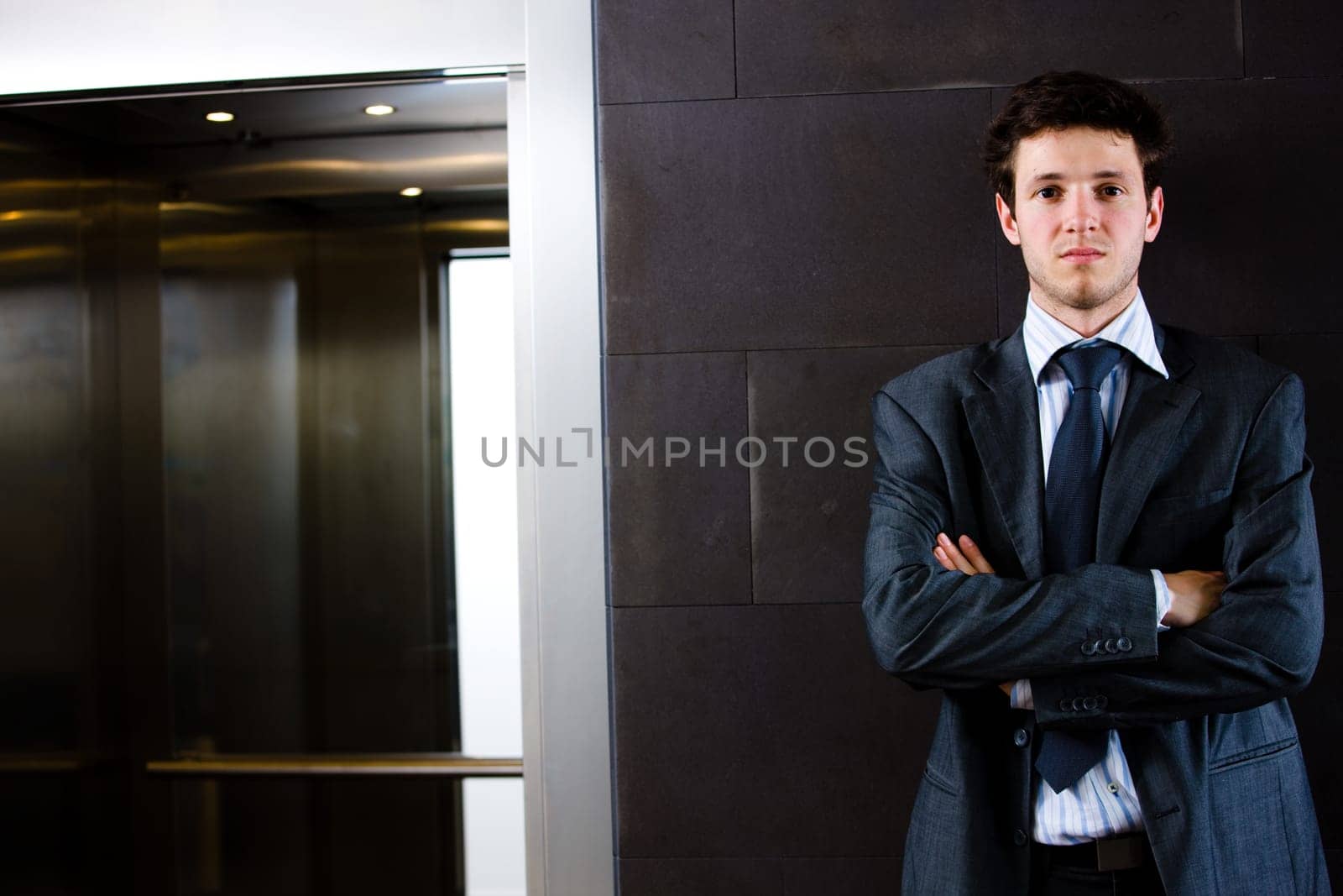 Portrait of satisfied businessman
