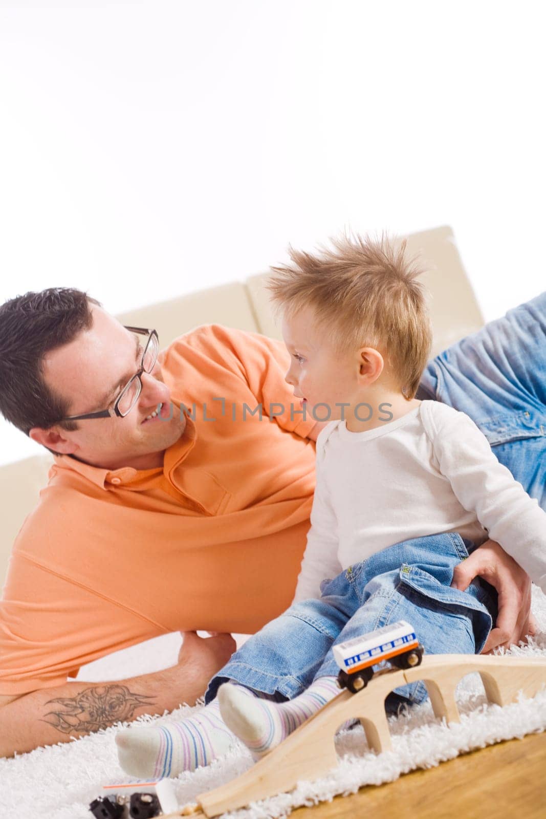 Father and child playing