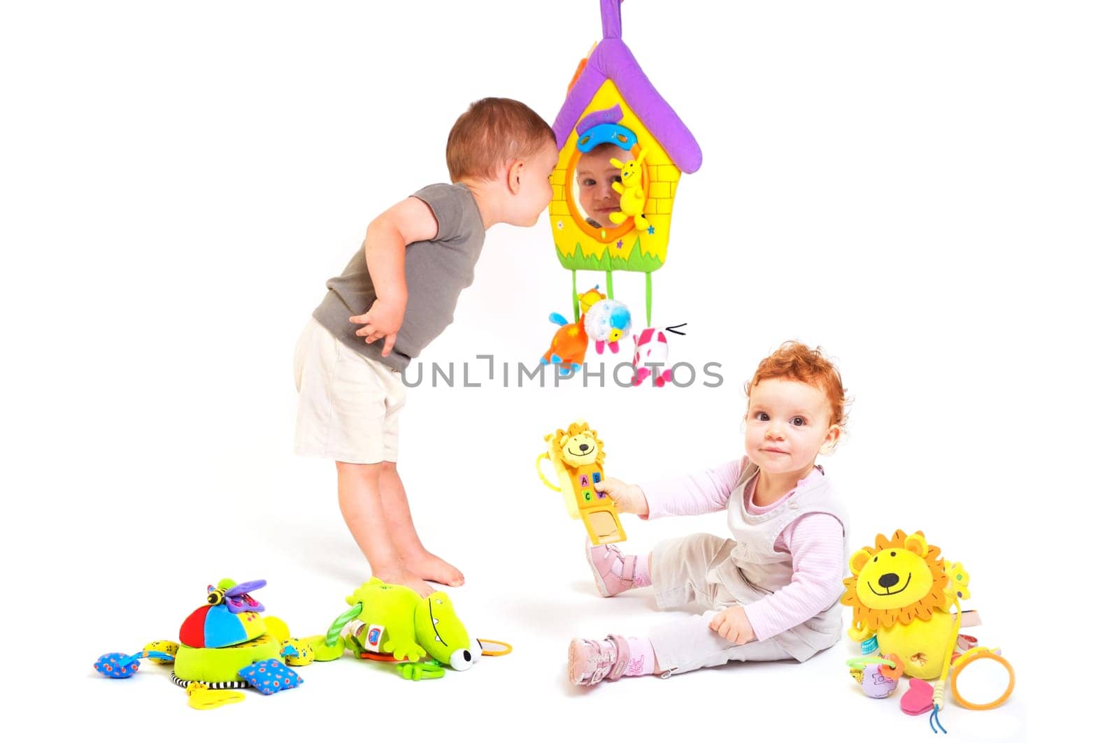 Babies play with toys
