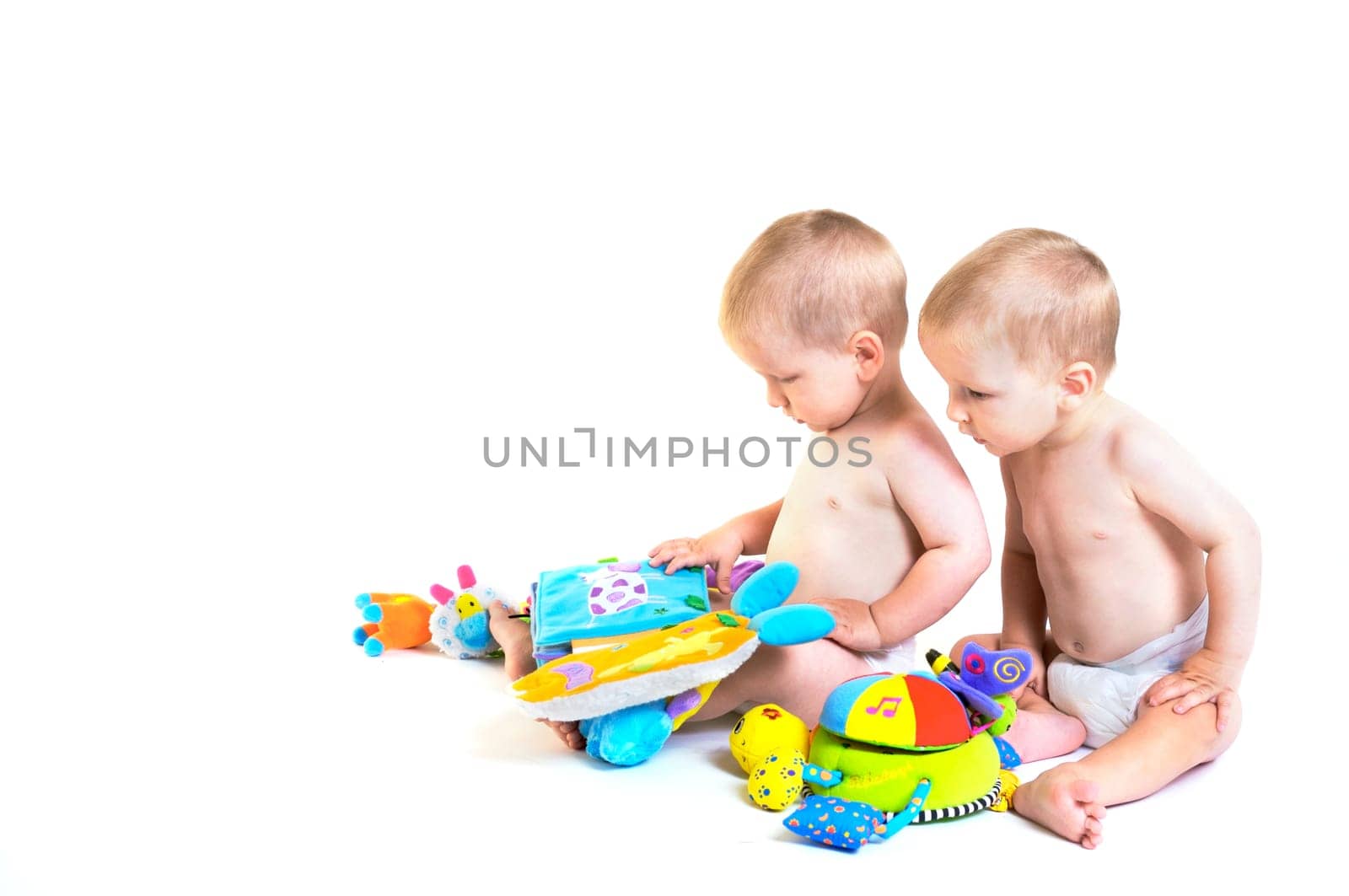 Baby twins playing