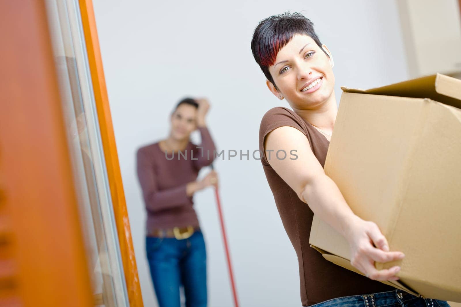 Young woman with cardboard box