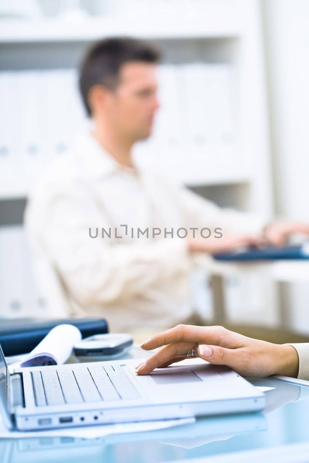 Hand typing on keyboard