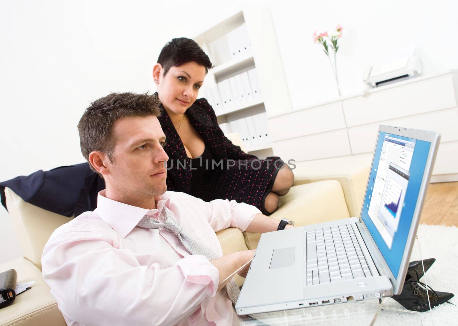 Businesspeople with laptop
