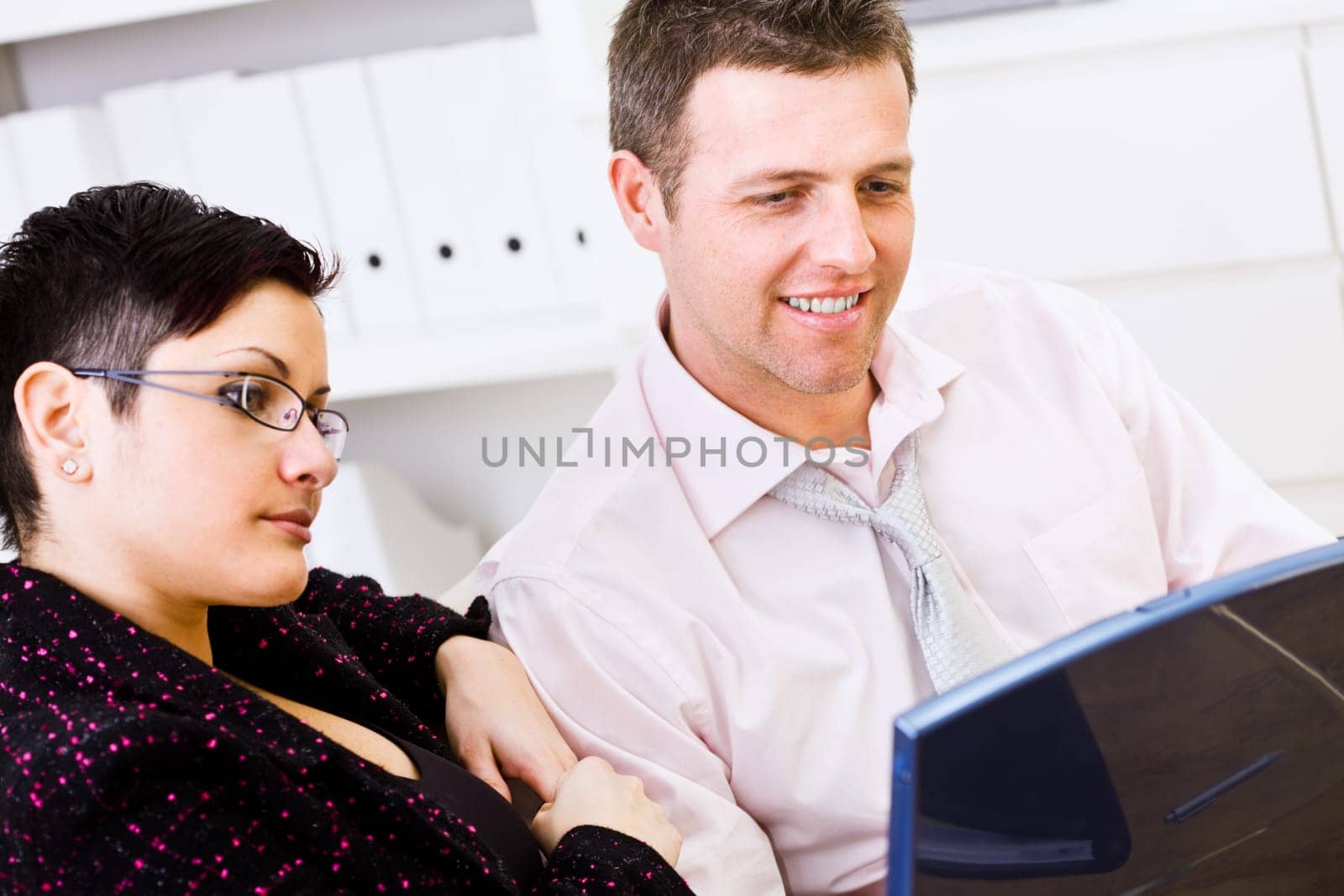 Happy businesspeople working together
