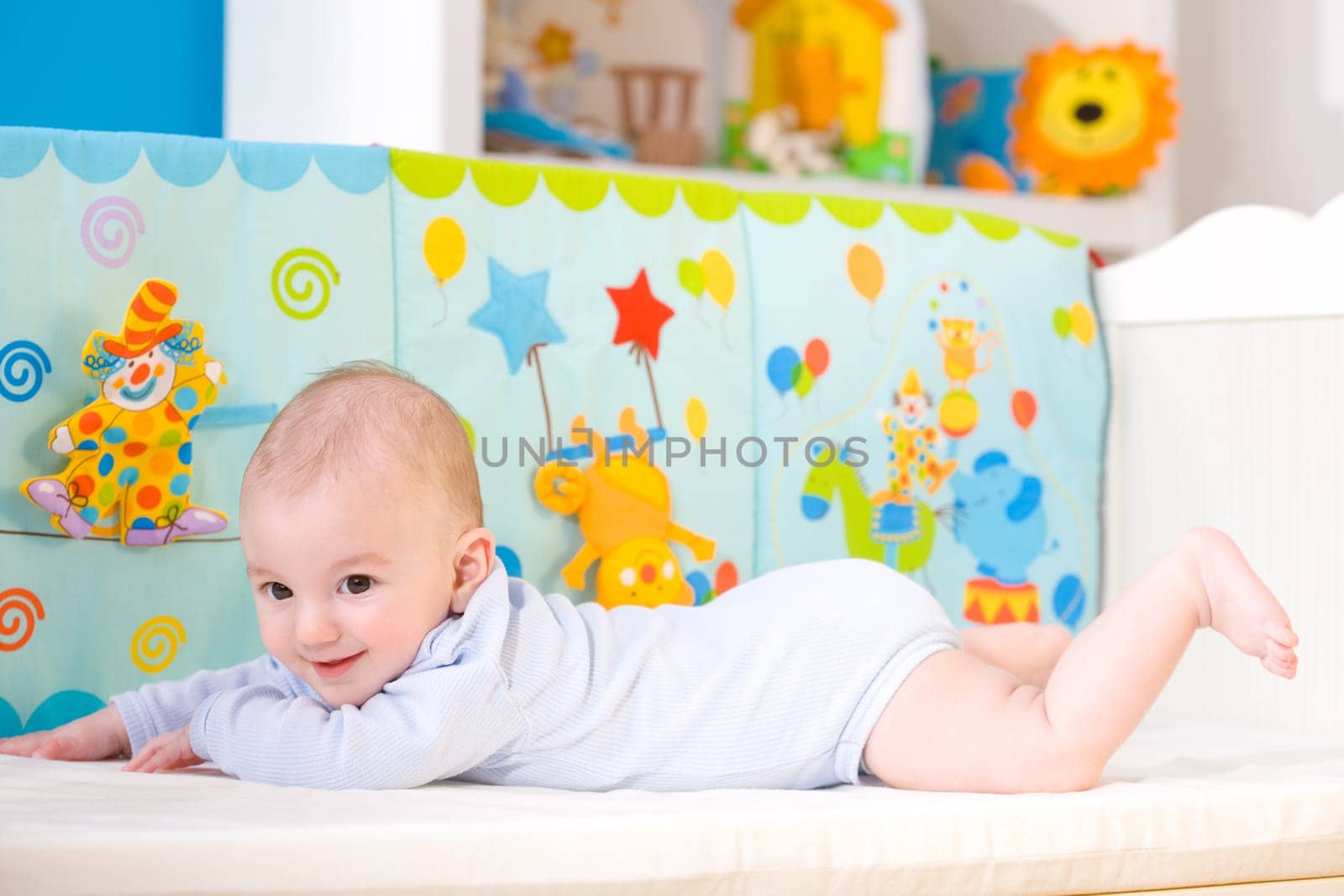 Happy baby on crib