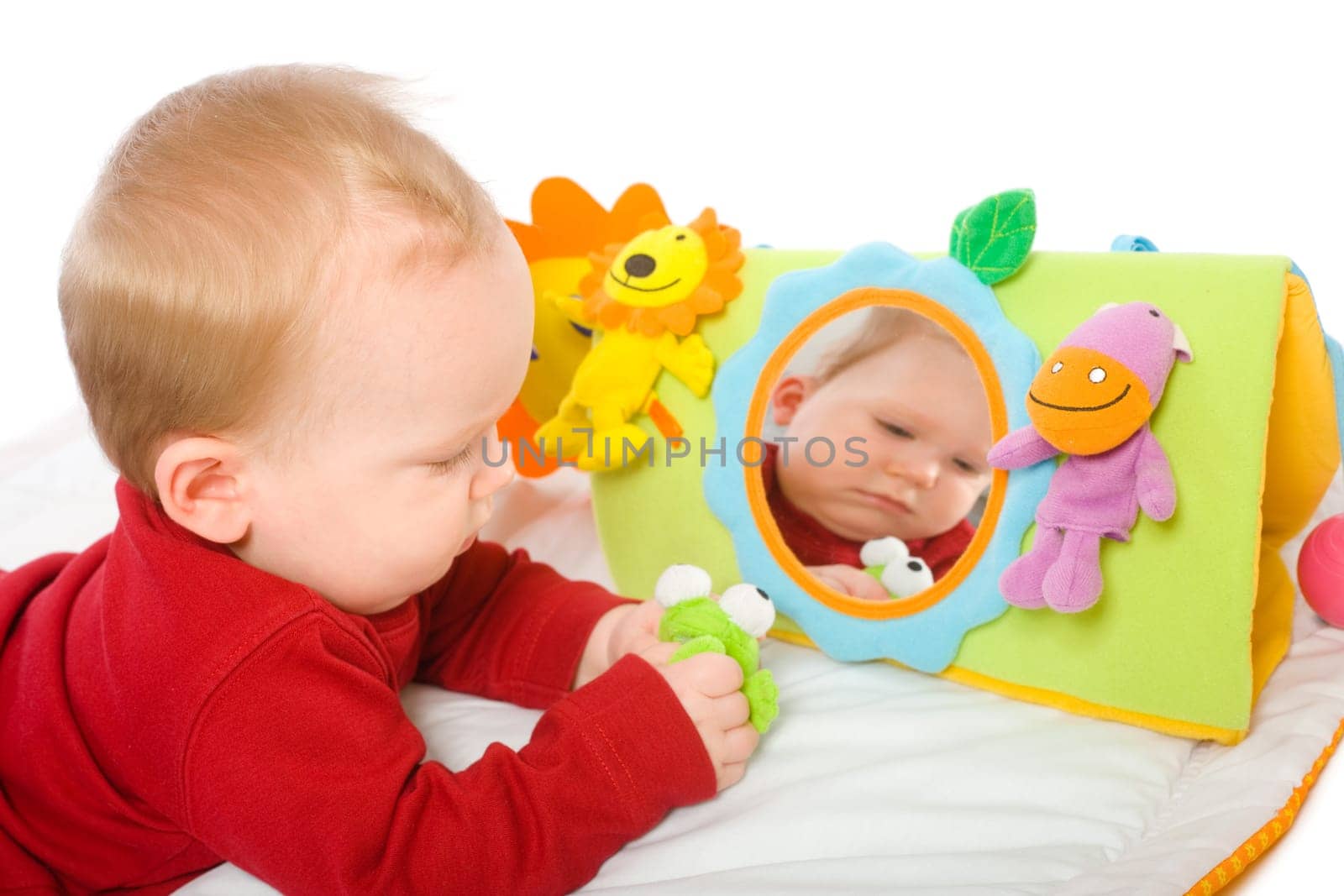 Baby boy playing with toys