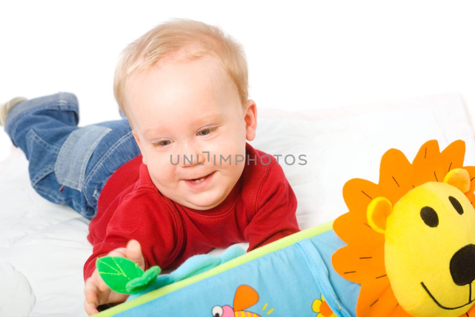 Baby boy playing with toys