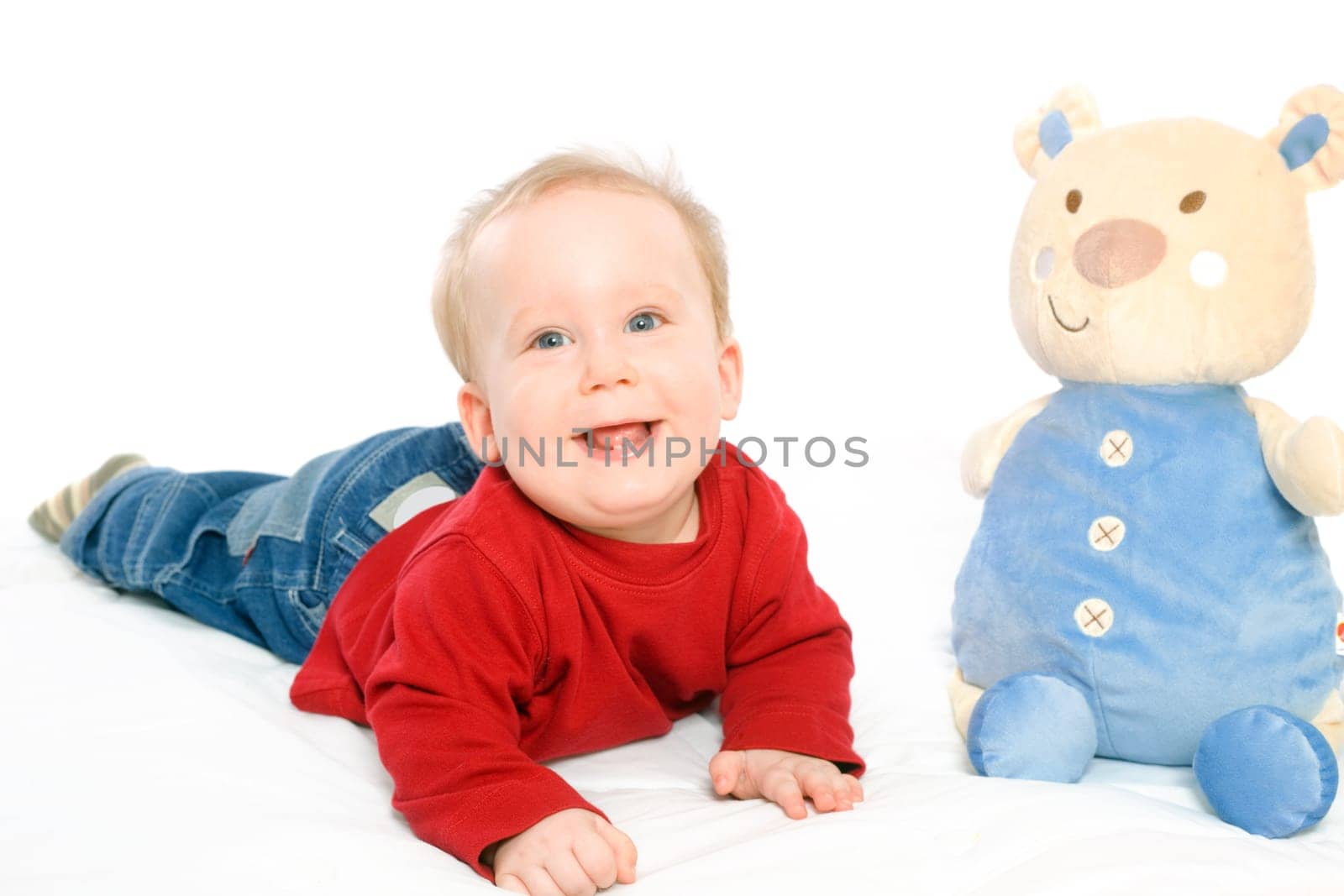 Baby boy playing with toys