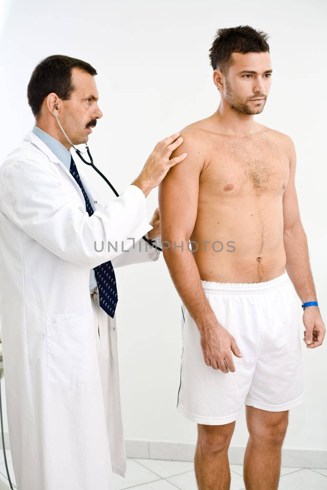 Doctor examining patient