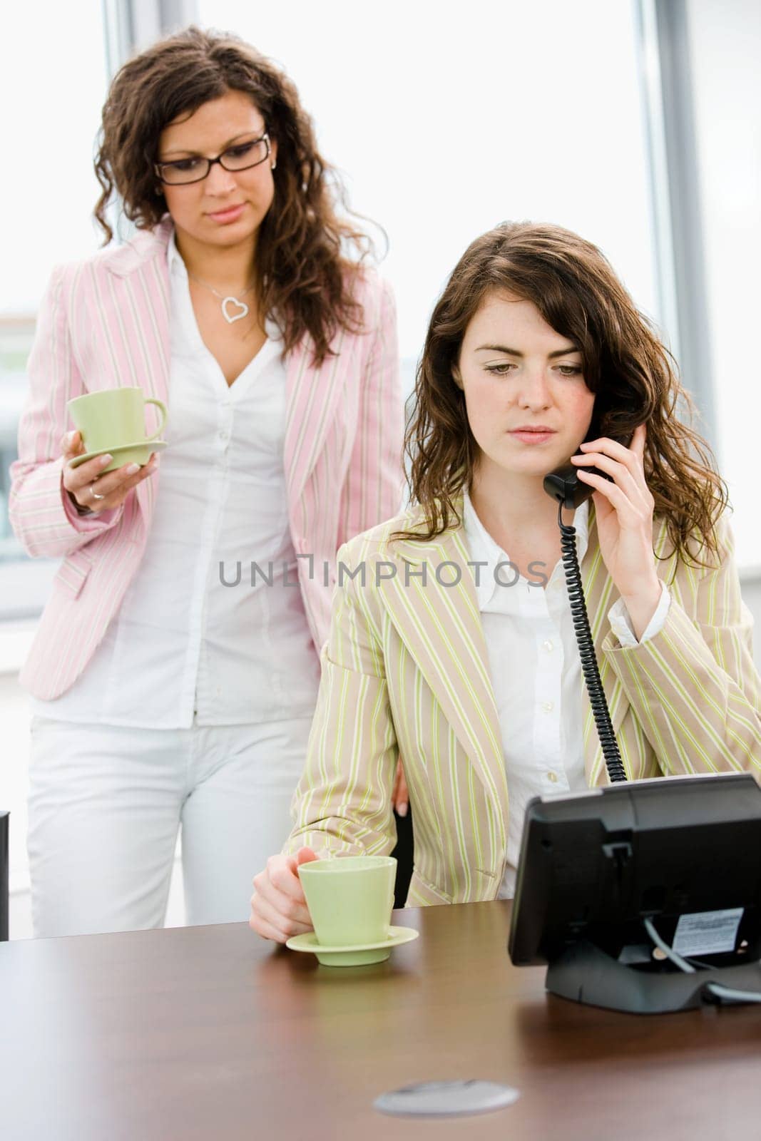 Businesswomen talking on phone