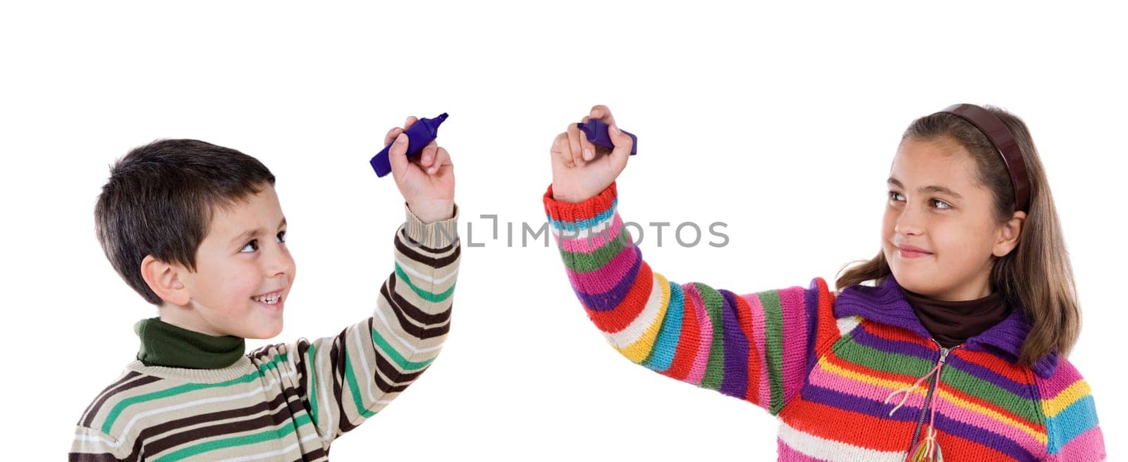 Two adorables children writing