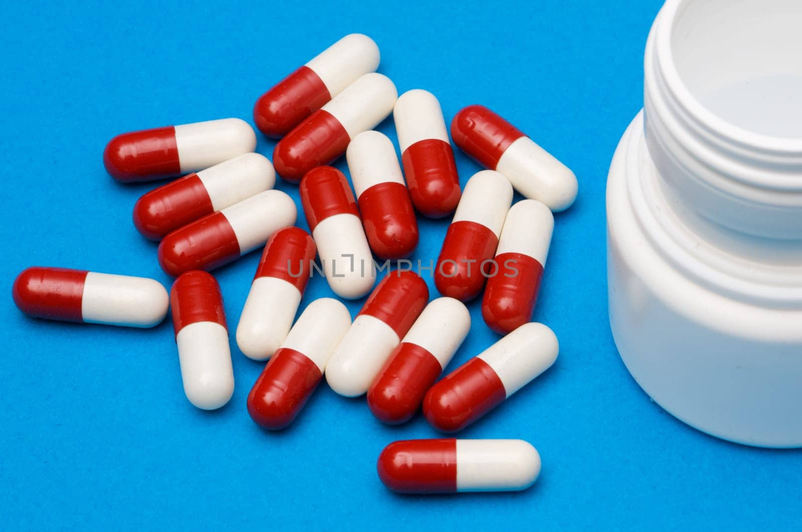 Pills over blue background