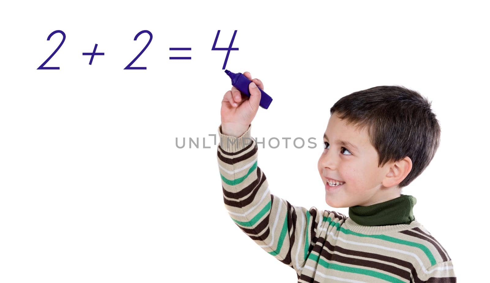 Adorable child writing a sum