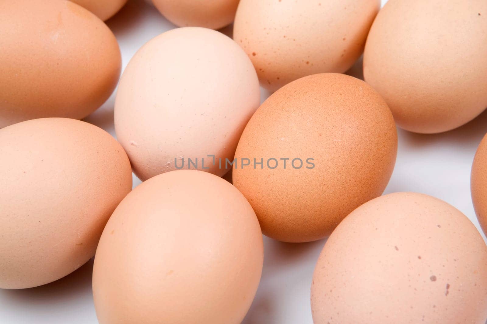 Photo of many brown hen eggs