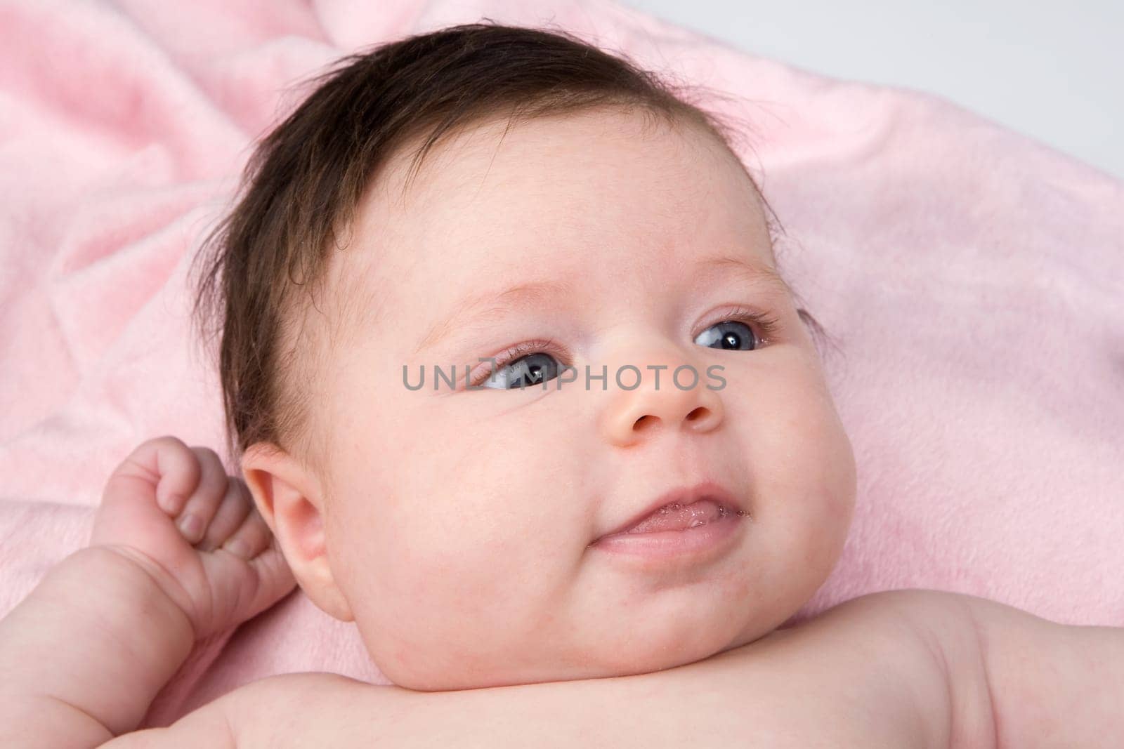 Adorable baby newborn with blue eyes