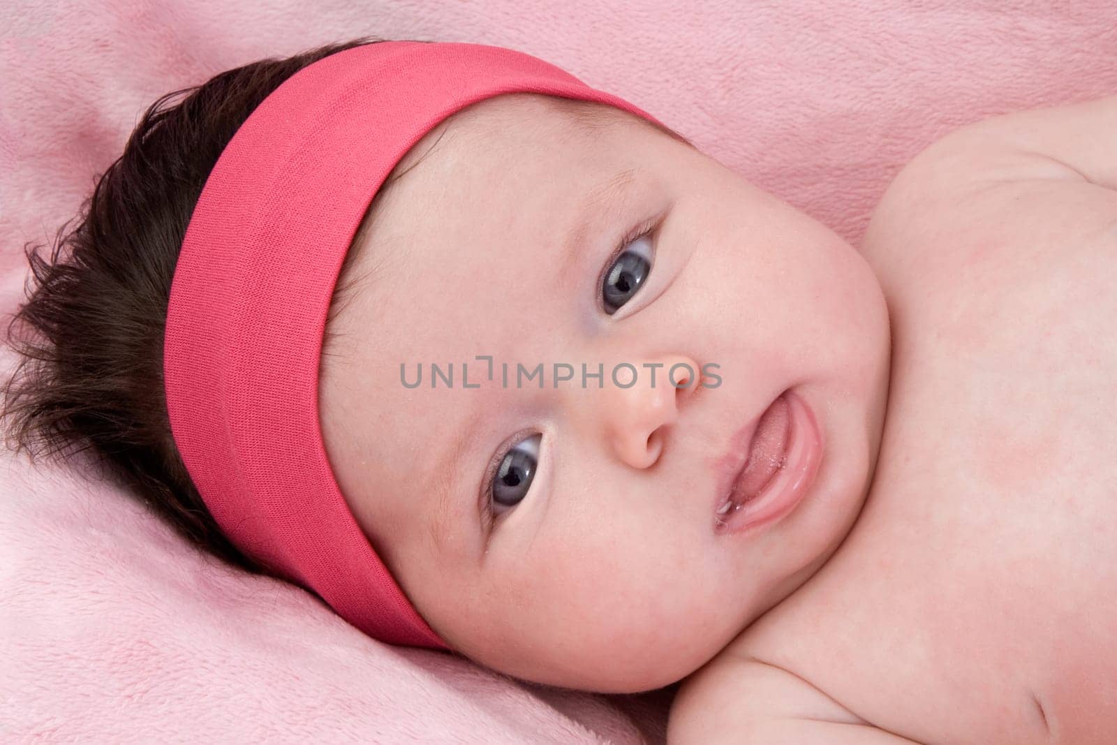 Adorable baby newborn with blue eyes