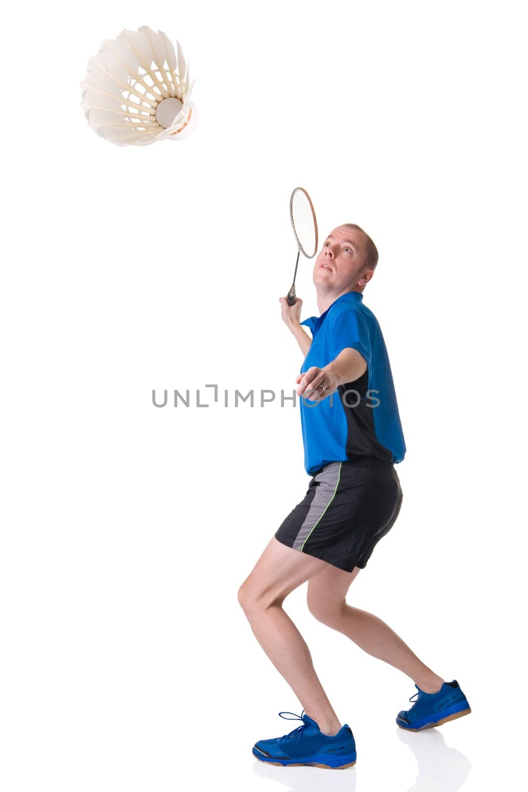 Man playing badminton