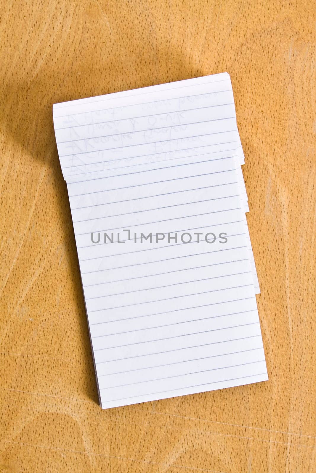 Notepad on wooden table