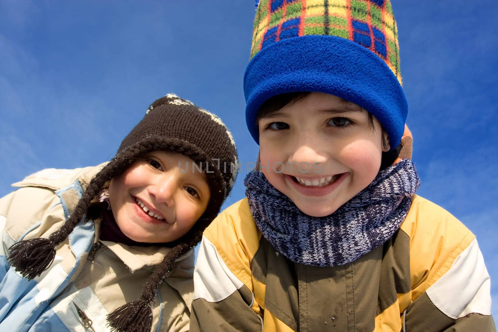 Cute girl and boy winter portrait