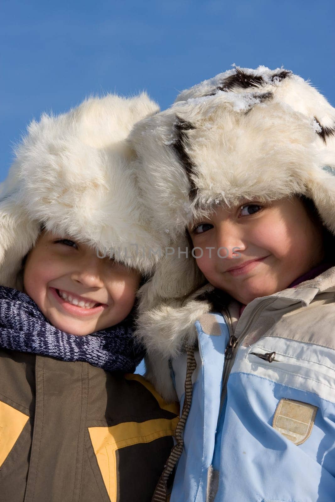 Children portrait in the fur-cup