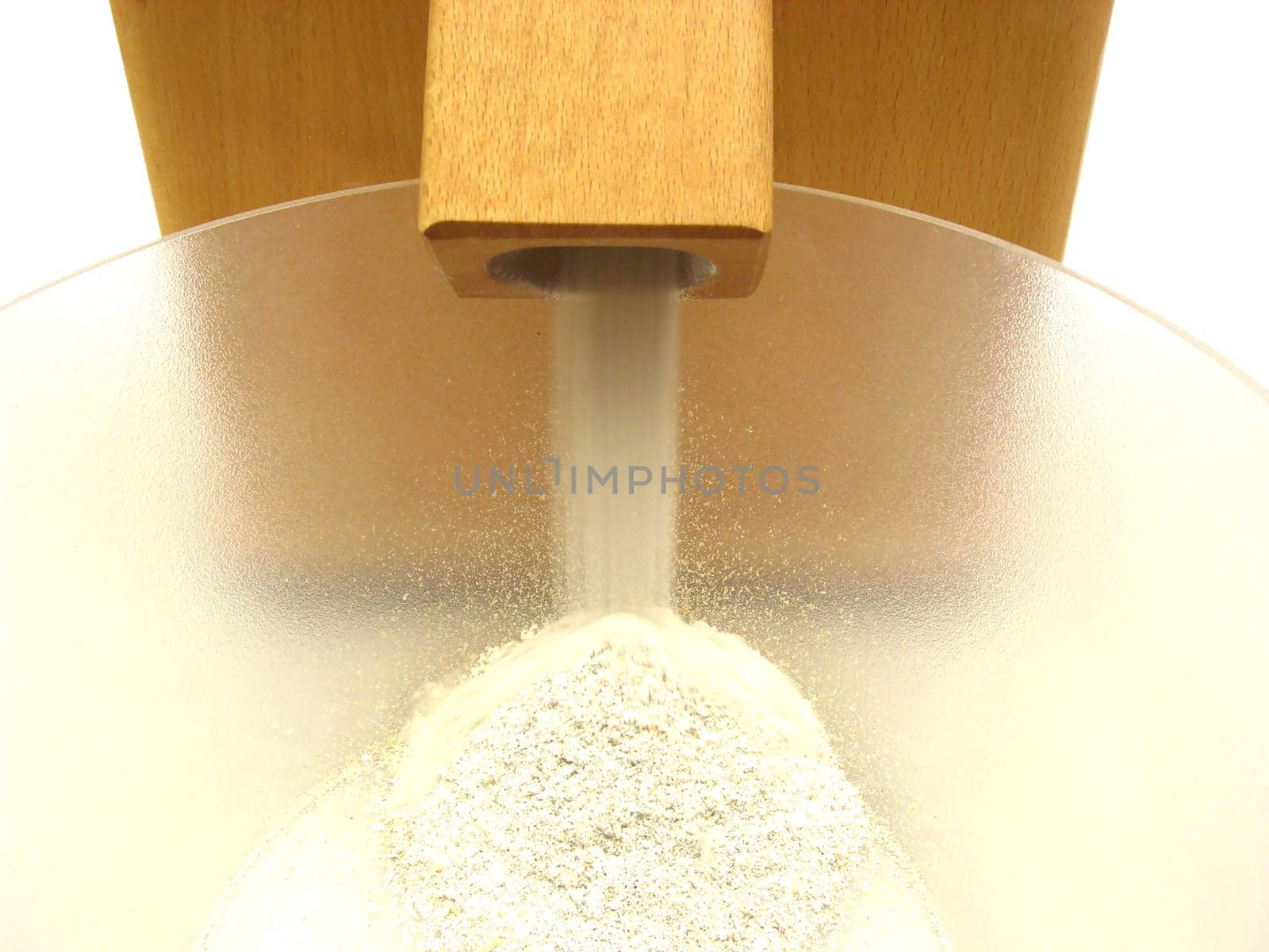Watching the work of a flour mill