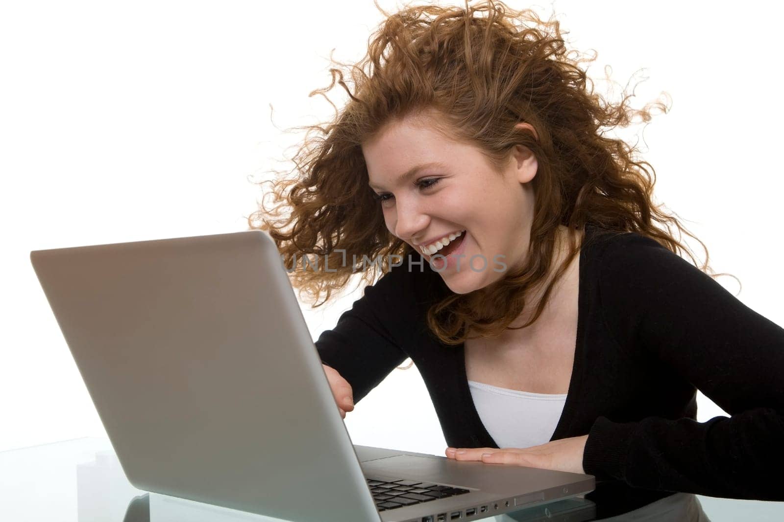 redhead teen with laptop