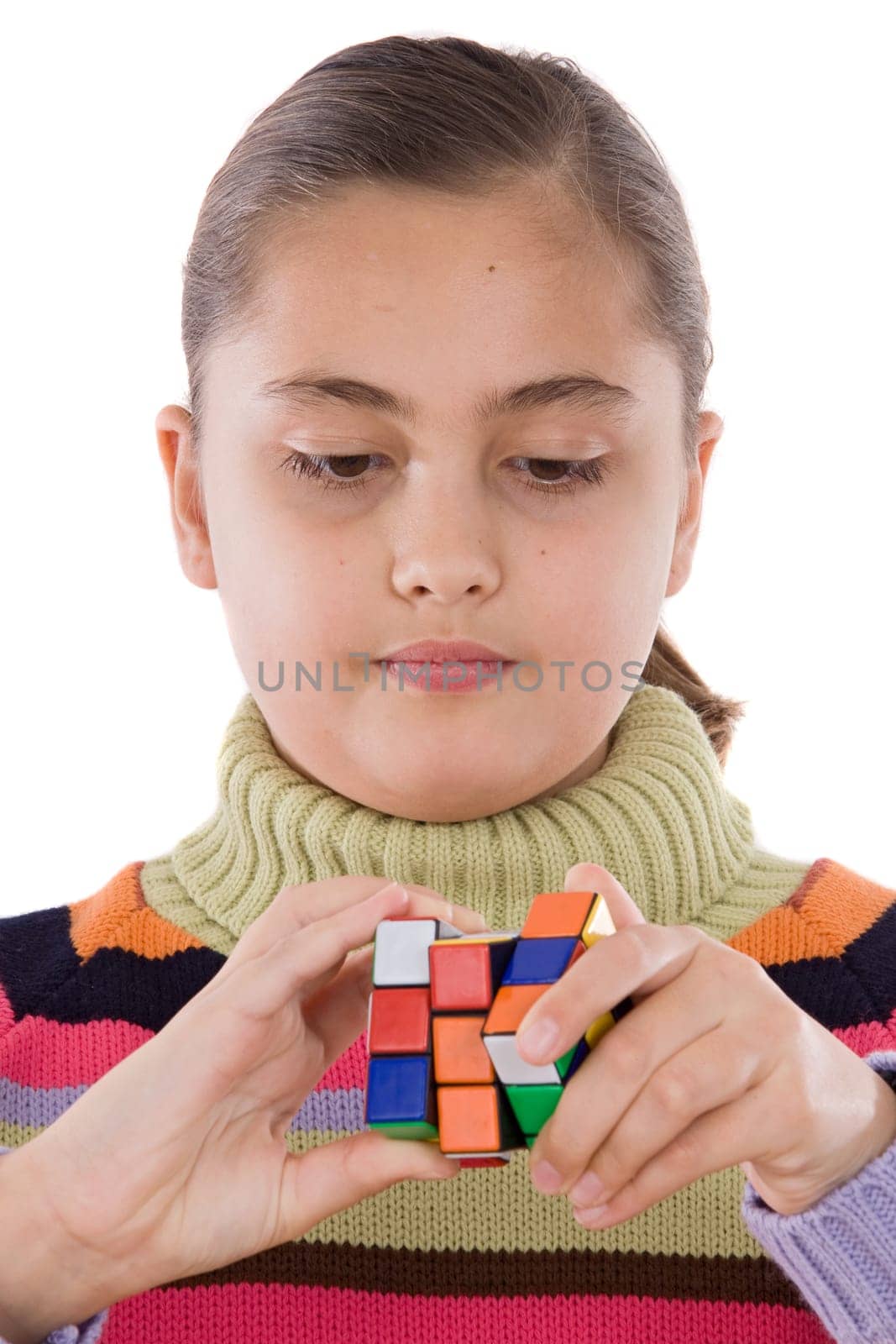 Little girl playing with a colorfull cub