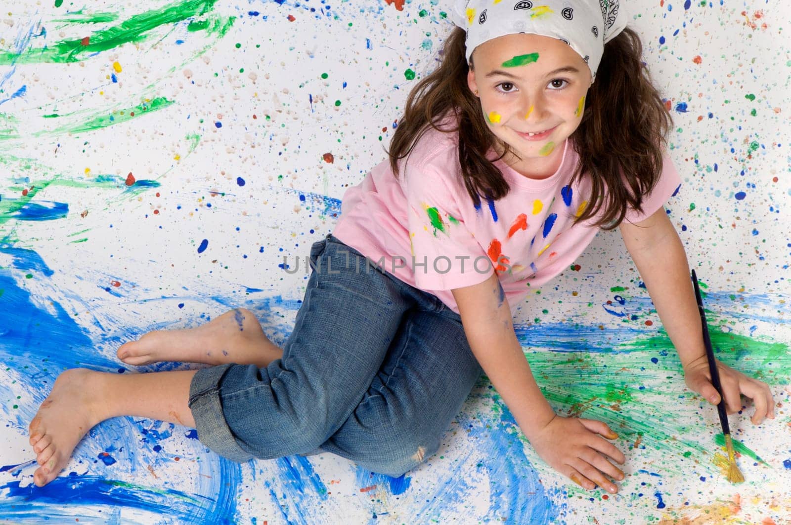 Girl playing with painting
