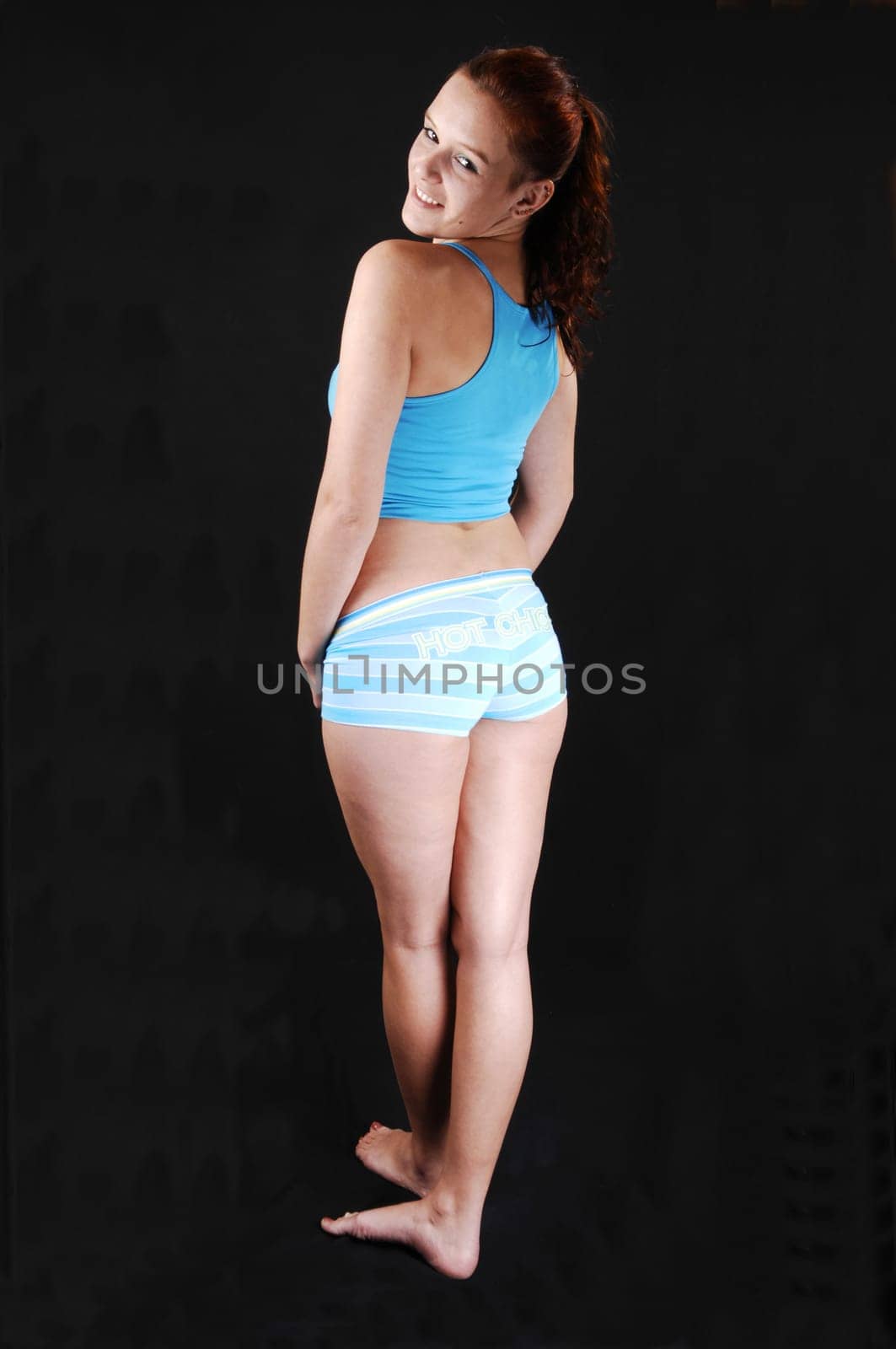 Woman in exercise clothing.
