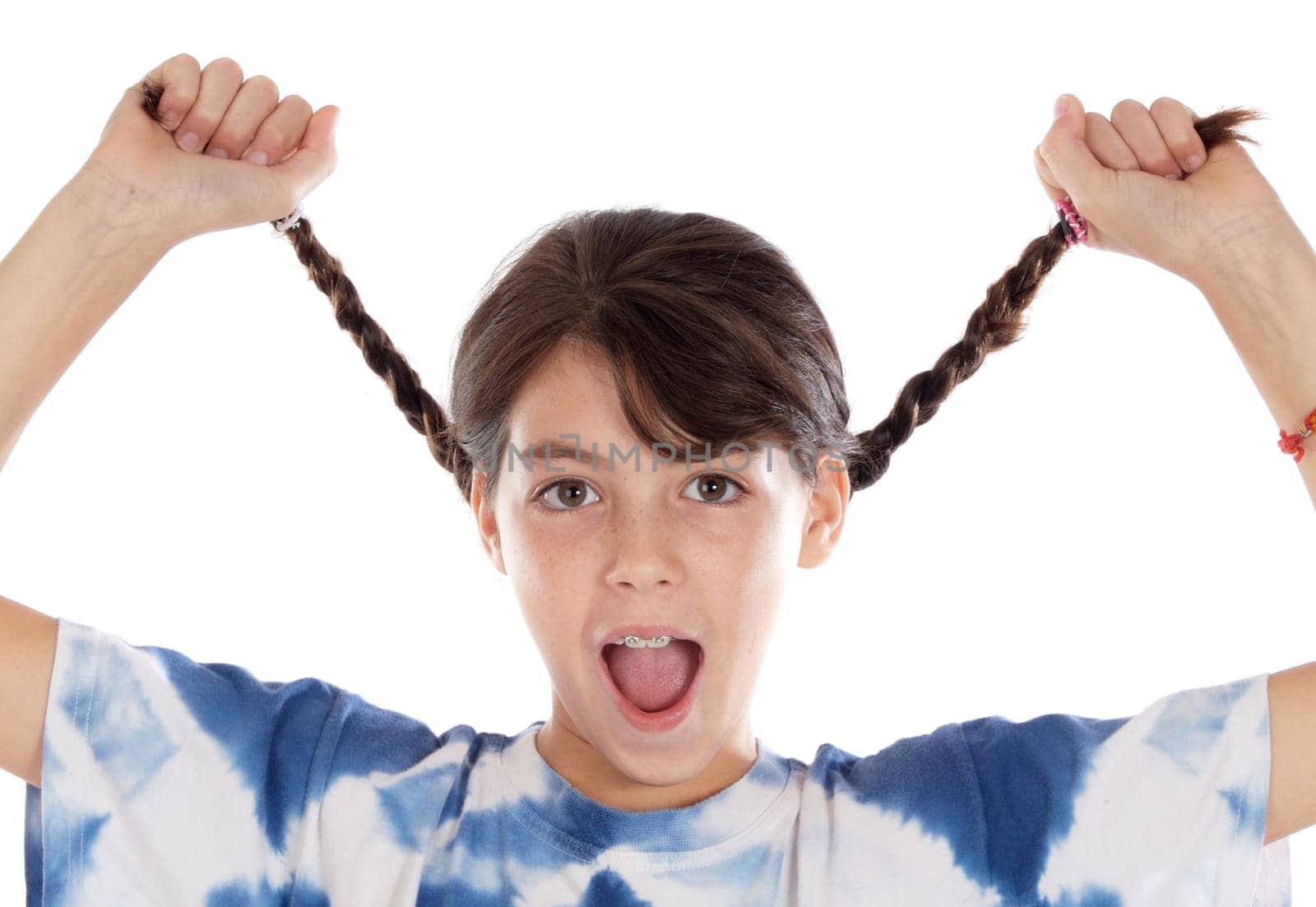 girl holding braids and shouting