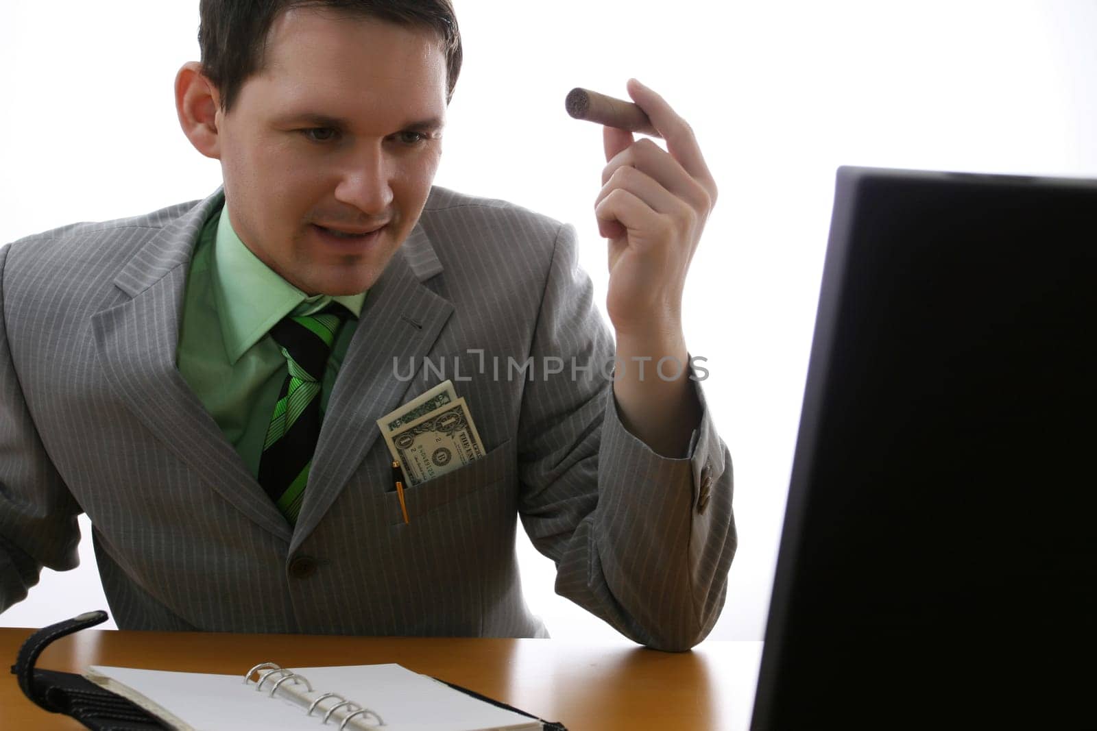 Happy businessman with cigar