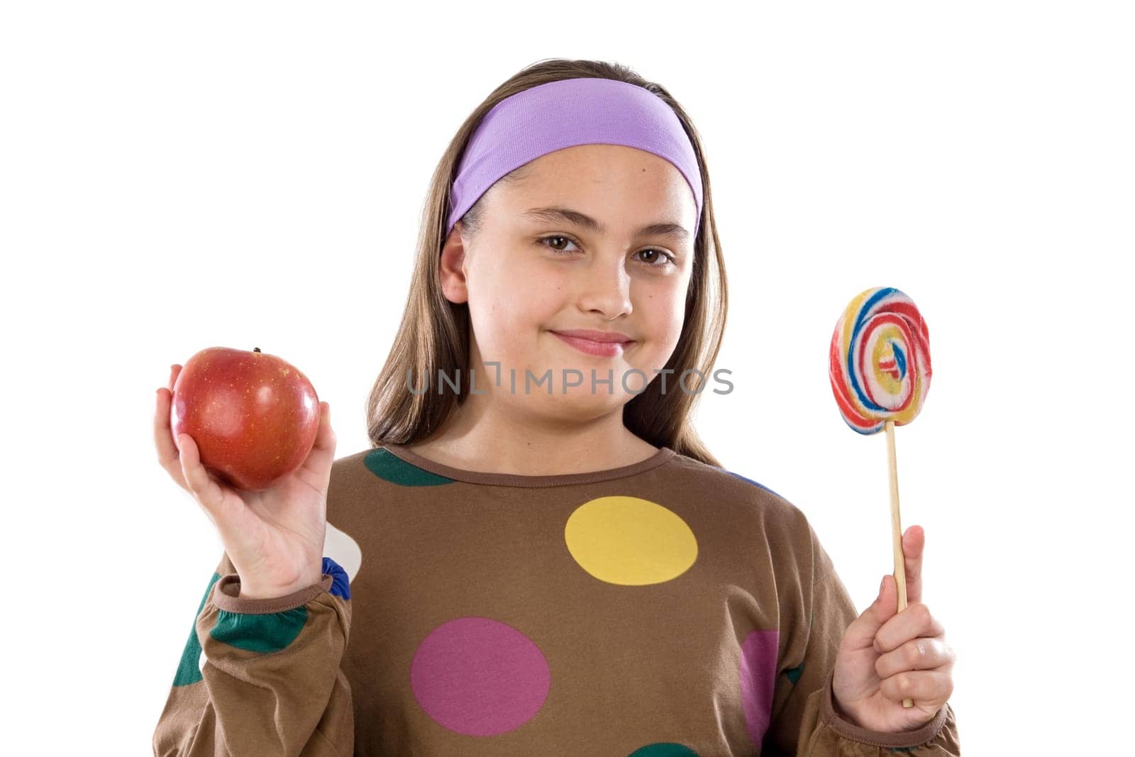 Girl with lollipop and apple