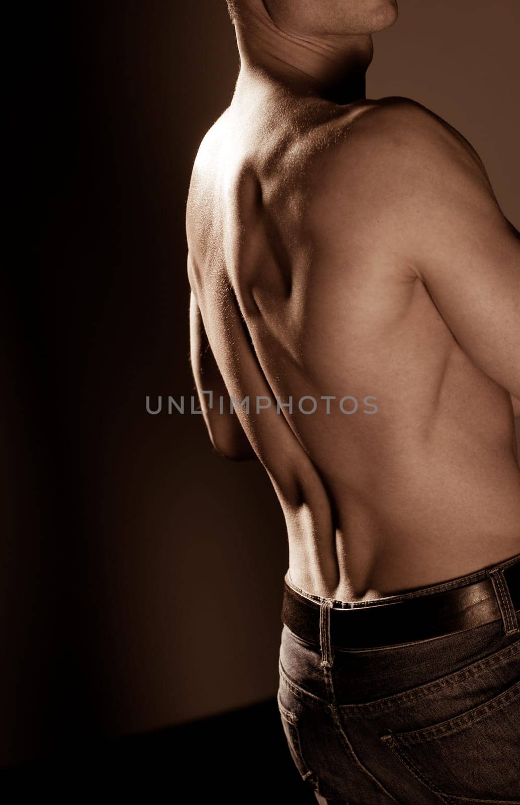 Naked man's back
