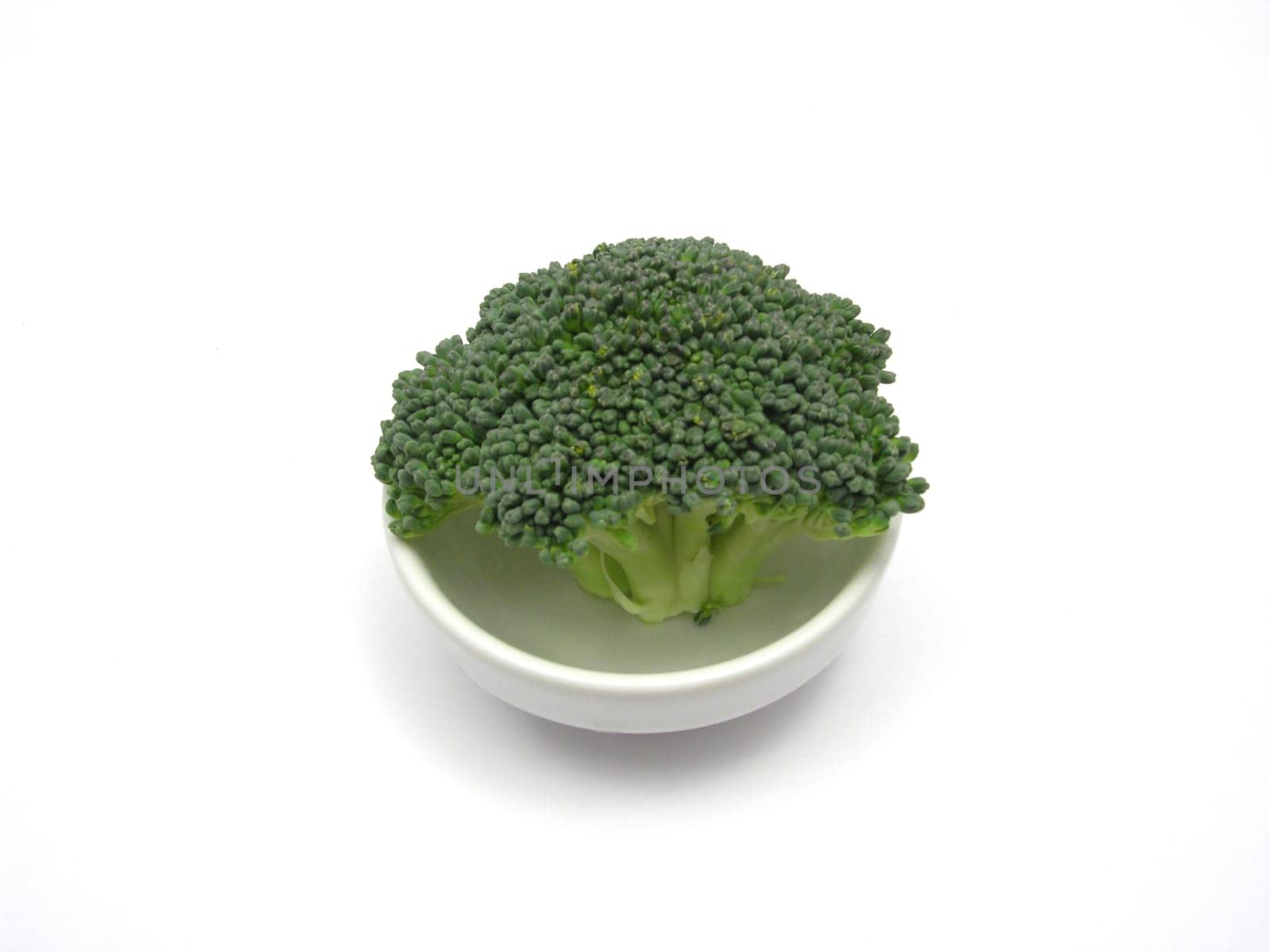 Broccoli in a small porcelain bowl