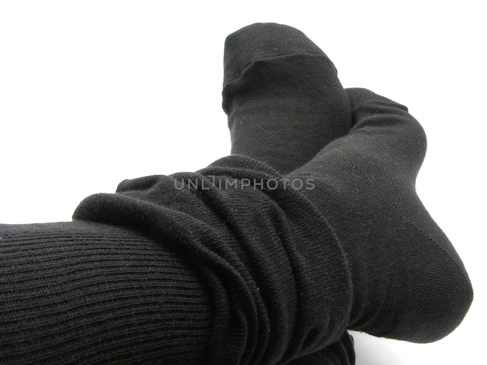Feet in black,thick,long stockings