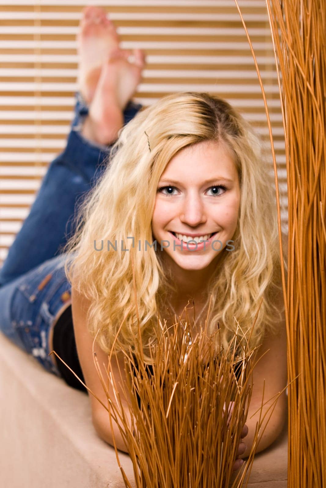 young female model laying on the floor