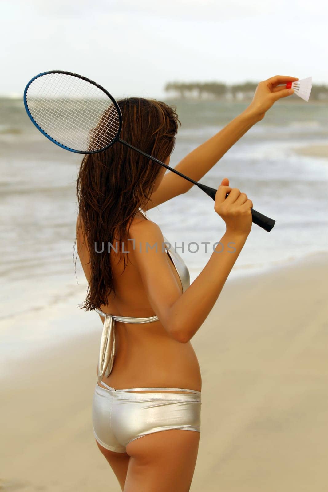 Woman playing badminton