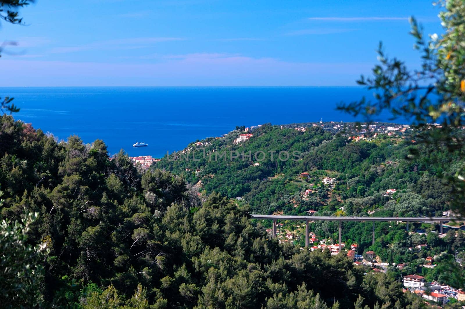 View of the Mediterranean Sea near Menton,on the right motorway viaduct of the A8 motorway,lake